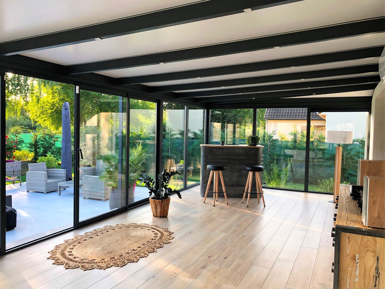 Exemple de véranda  avec Parquet.