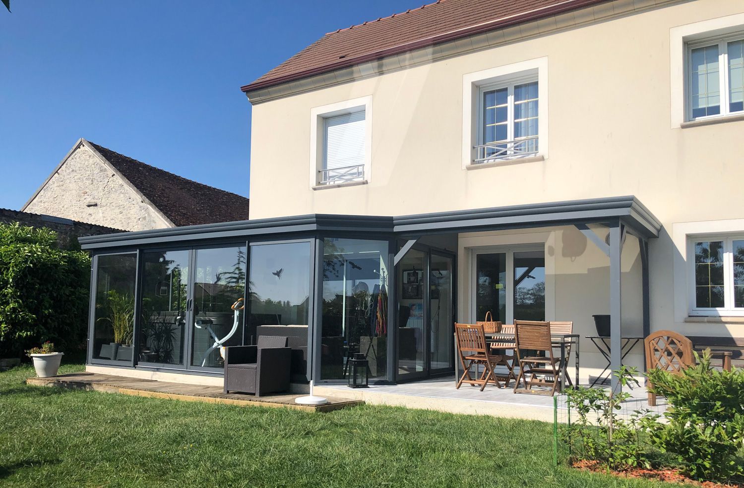 Exemple d'extension avec  véranda et pergola 