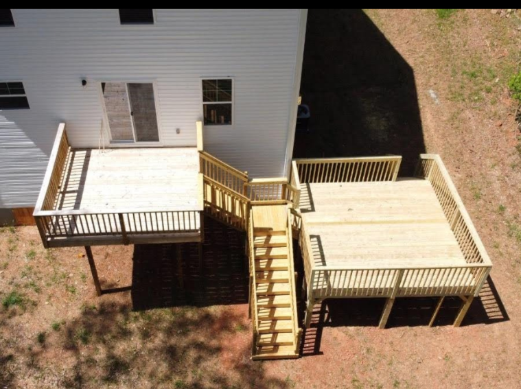 An aerial view of a deck with stairs leading up to it
