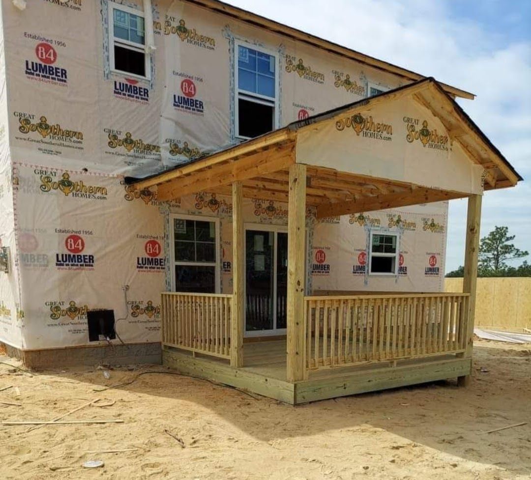 A house is being built with a porch and a lot of insulation