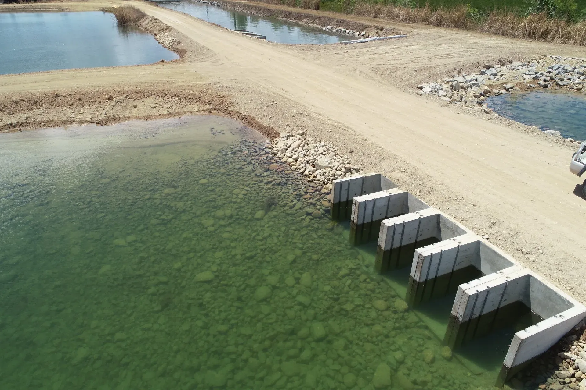 A Field with Water and Soil | Woree, Queensland | Cheshire Contractors