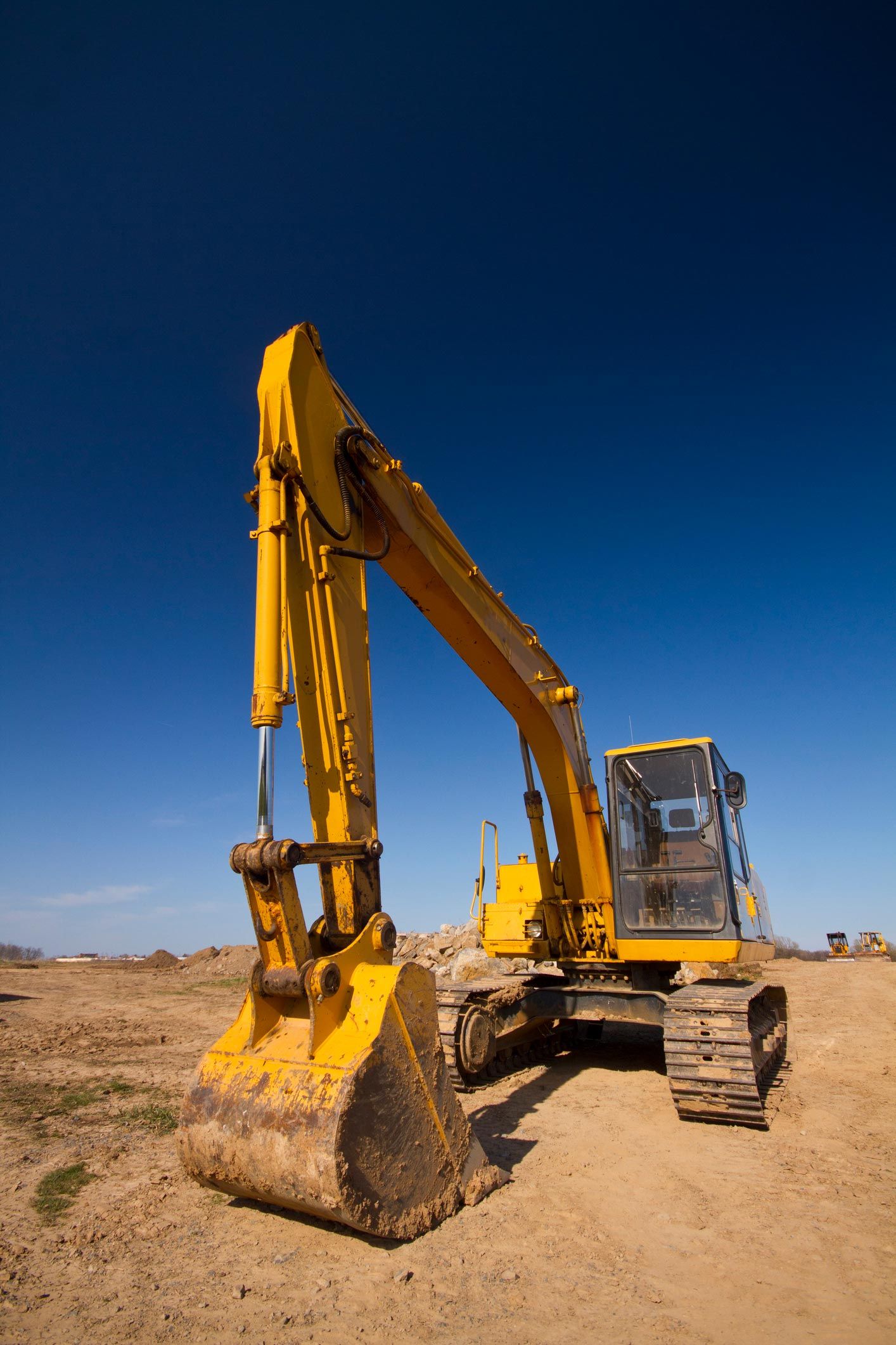 Excavators on a Sunny Day Standing in a Construction Site | Woree, Queensland | Cheshire Contractors