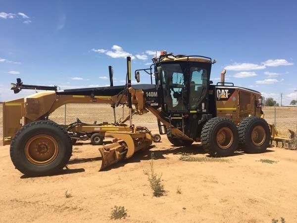 Long Yellow Tractor Side View | Woree, Queensland | Cheshire Contractors
