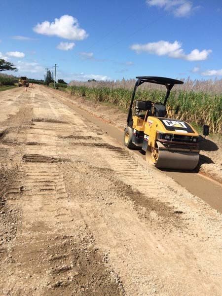 Yellow Road Roller and Grass on Side | Woree, Queensland | Cheshire Contractors