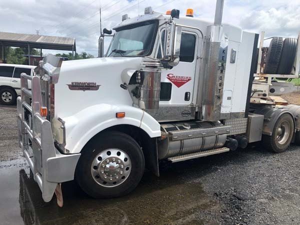 Side View of a Trailer Truck with a Stainless Part on Their Body | Woree, Queensland | Cheshire Contractors