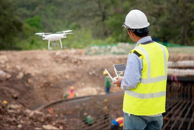 Man with Drone - Woree, Queensland - Cheshire Contractors