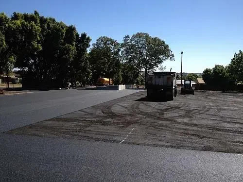 Tar Being Laid at Clifford Park Race Course | Woree, Queensland | Cheshire Contractors