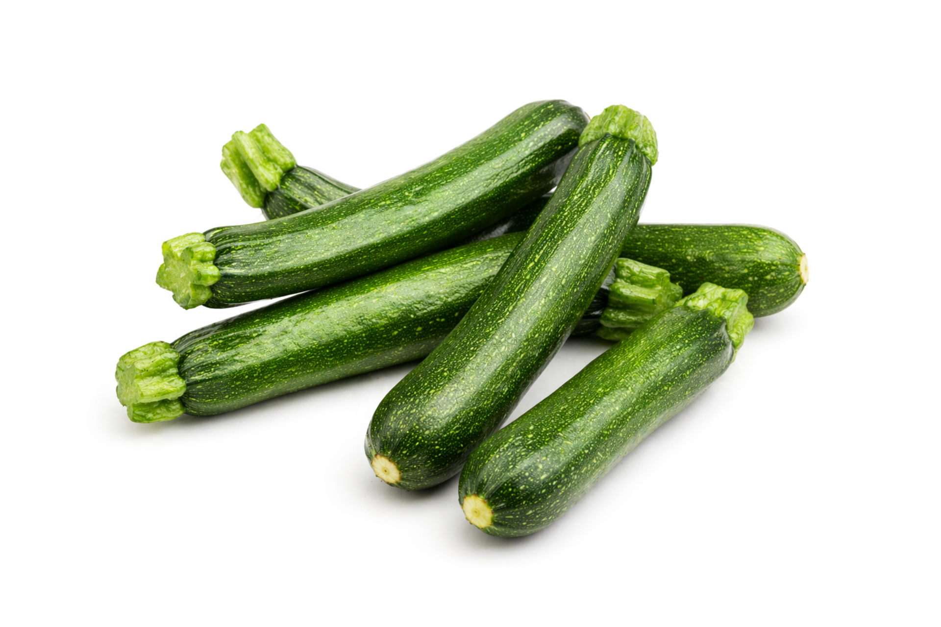 Small fresh courgettes arranged for wholesale supply