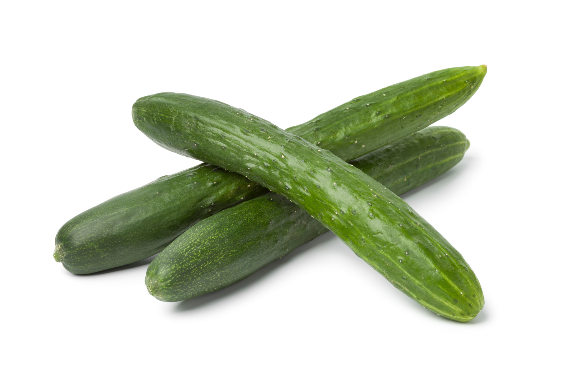 Whole cucumbers with smooth dark green skin