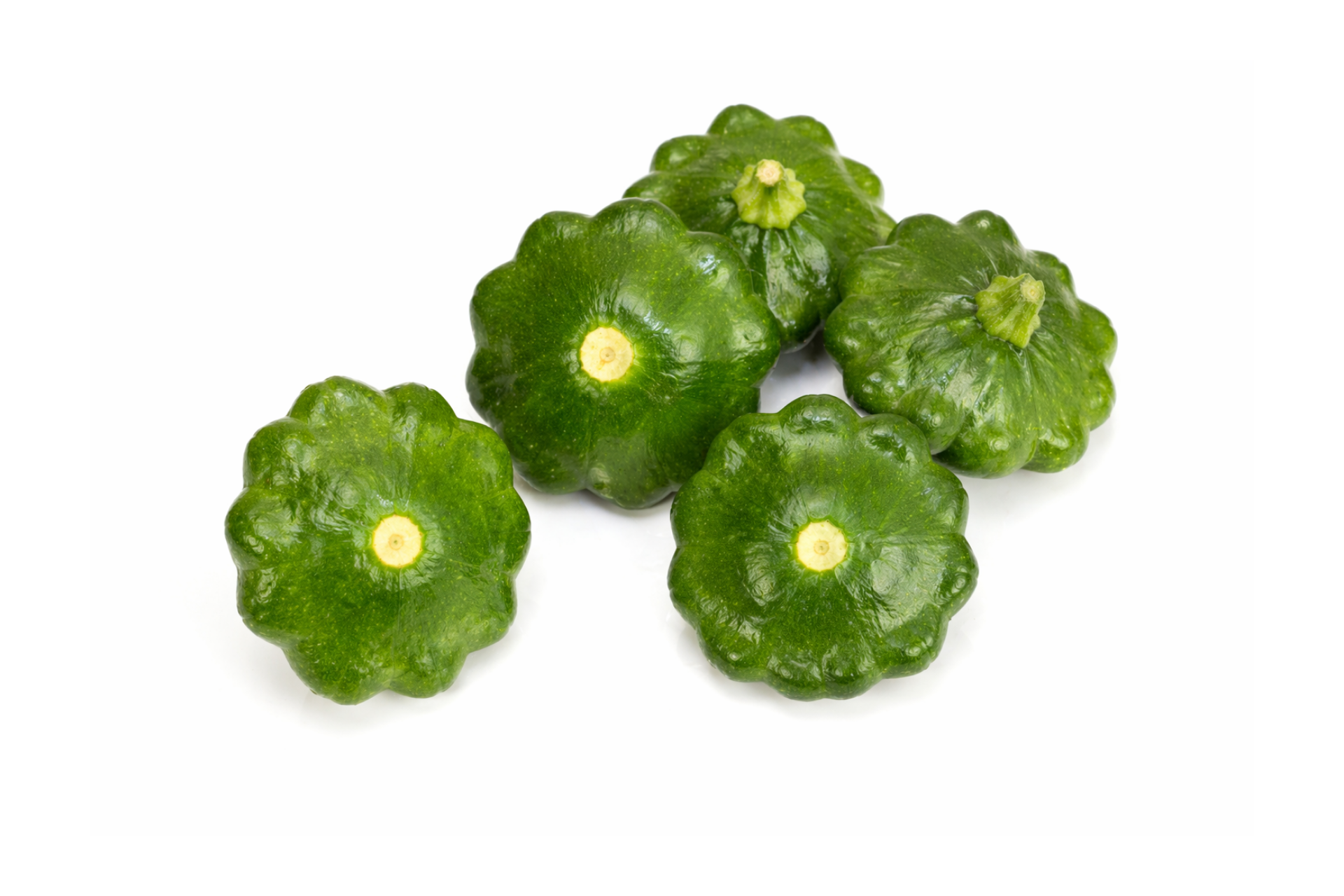 Green patty pan squash with scalloped shape and fresh skin