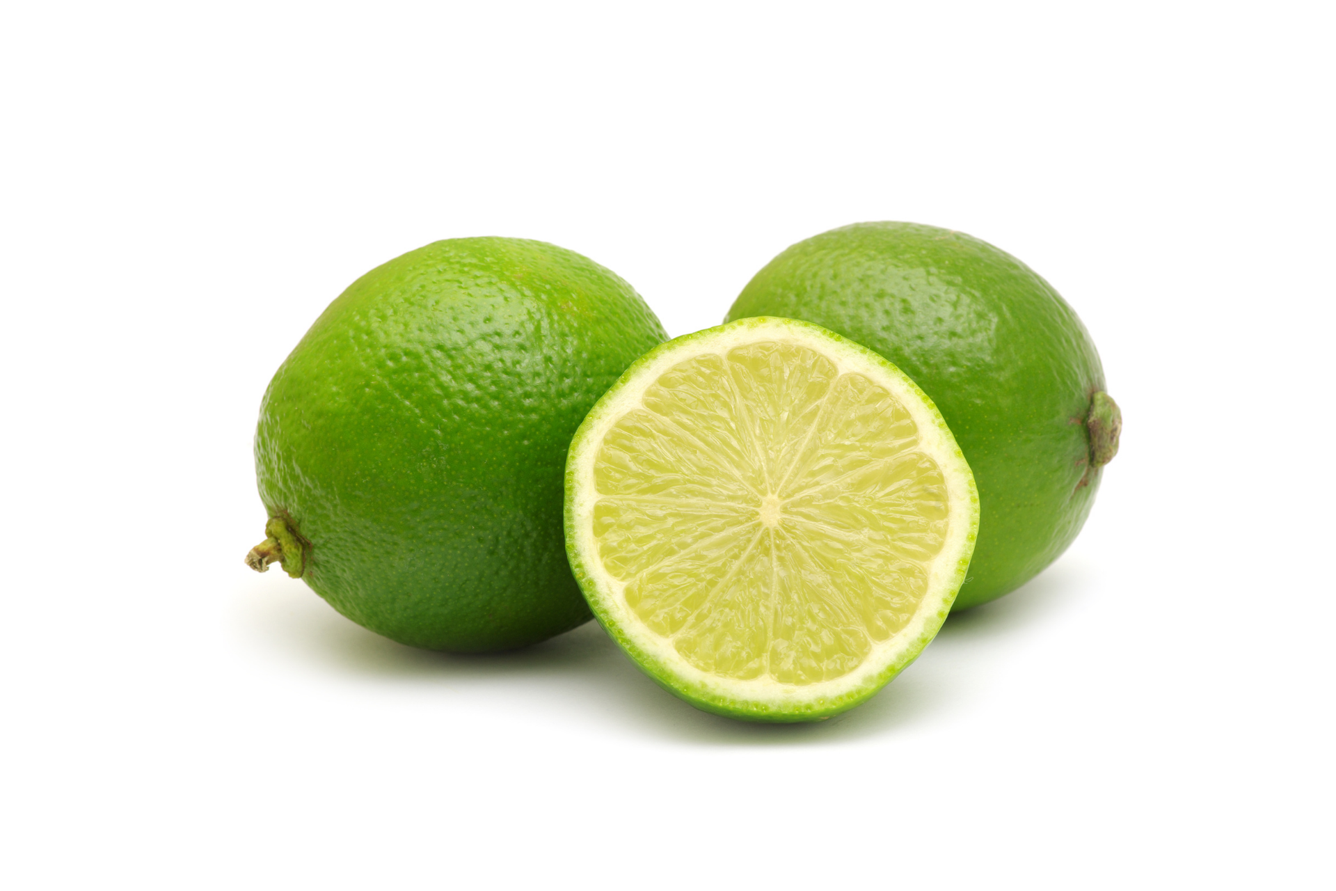 Whole limes with smooth green skin