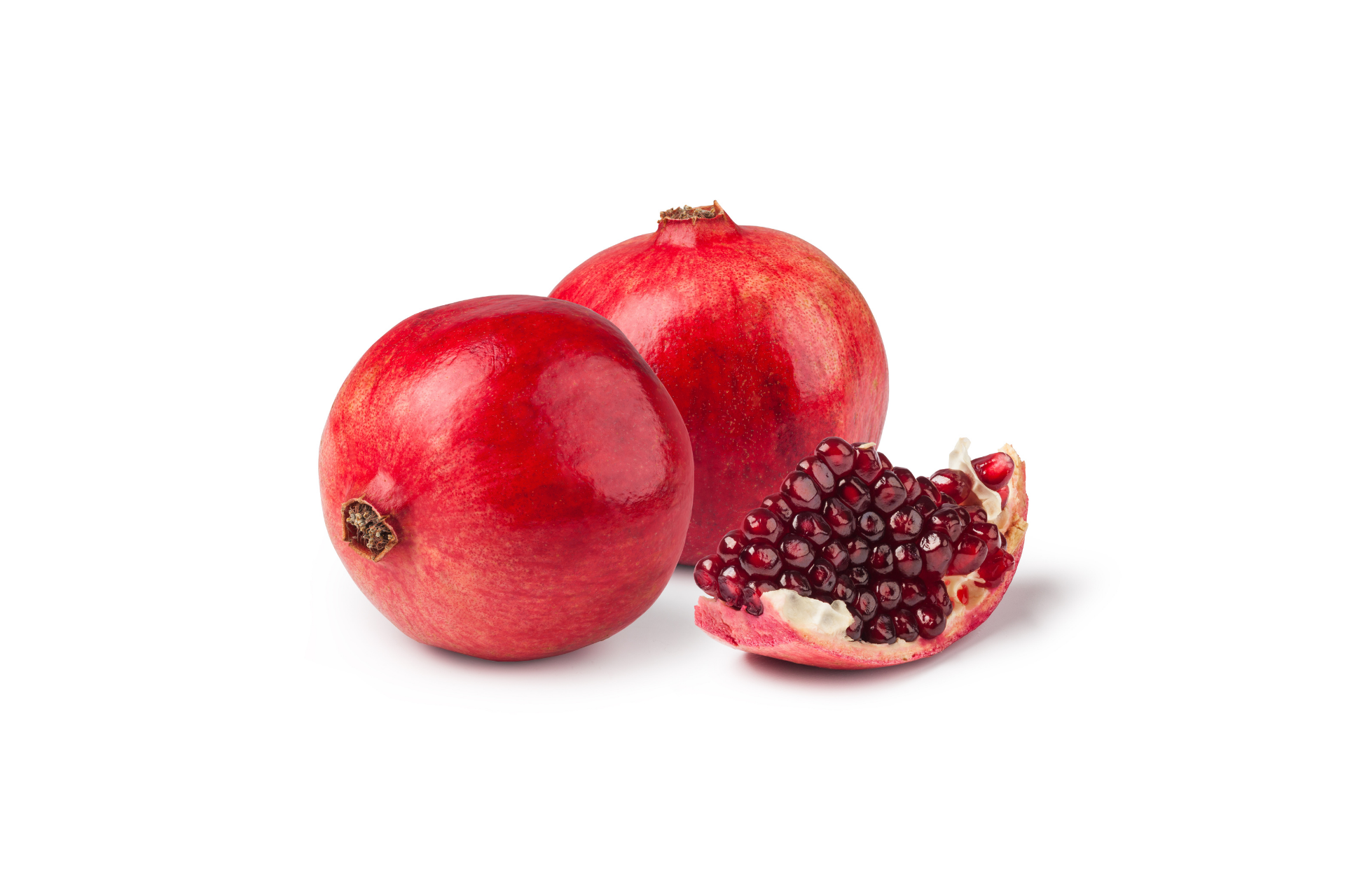 Whole pomegranate fruit with rich coloured skin