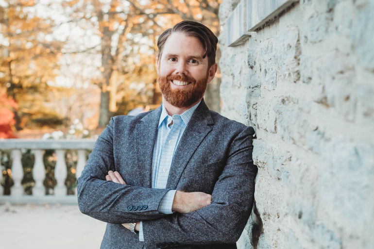 A close up picture of Financial Coach Grayson Stalvey in Cincinnati, Ohio.