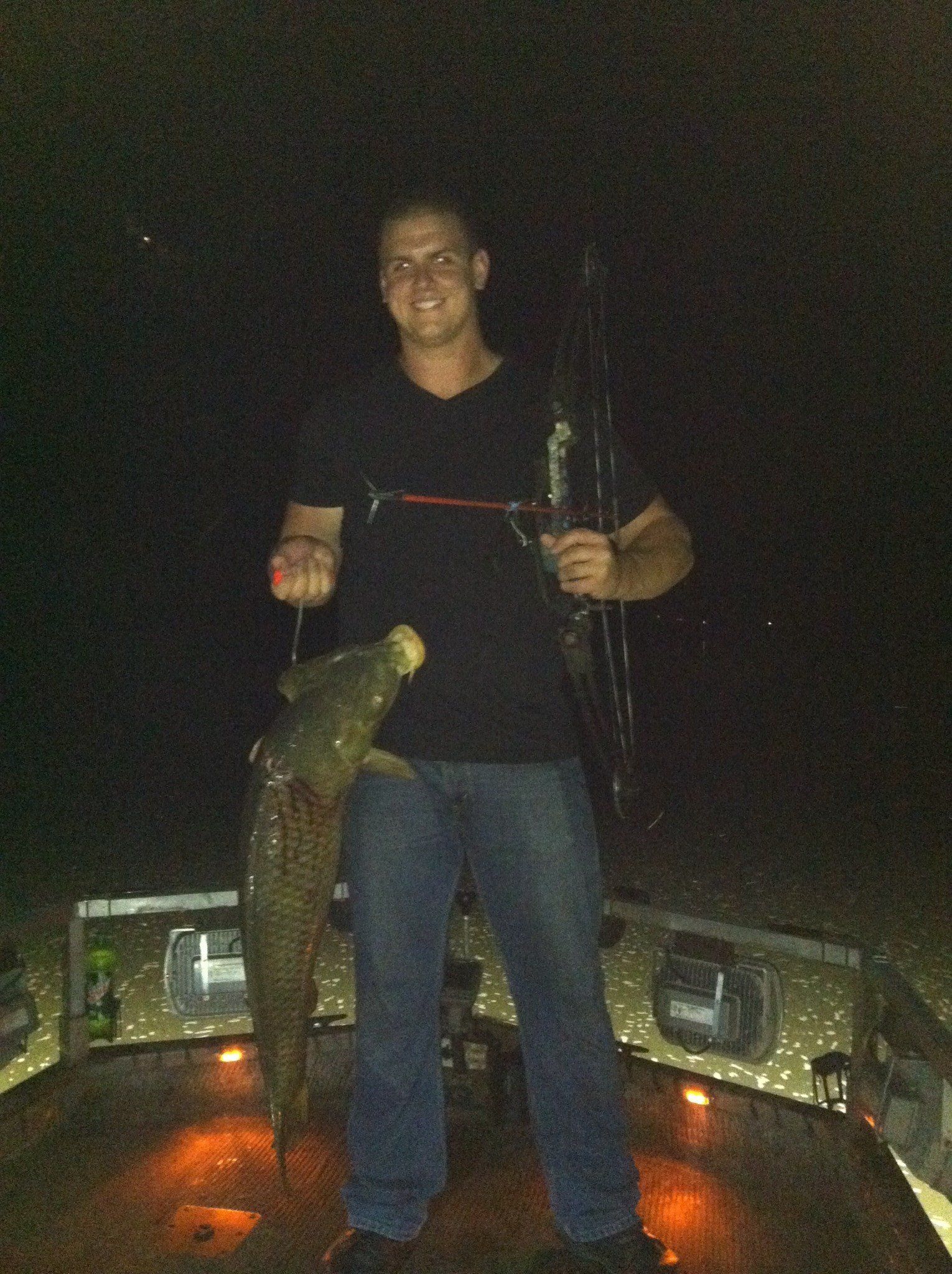 Man Holding a Hook with a Fish — Lancaster County, PA — Night Ventures Bowfishing Charters
