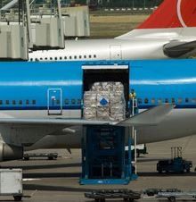 Air freight - good being loaded onto a plane