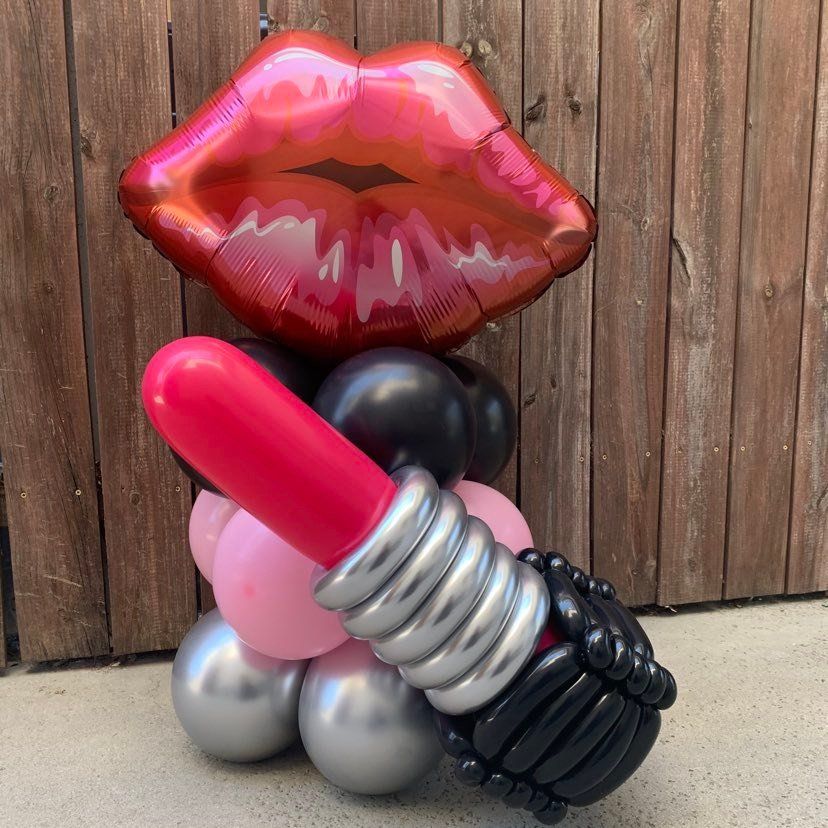 Lips and lipstick balloon sculpture