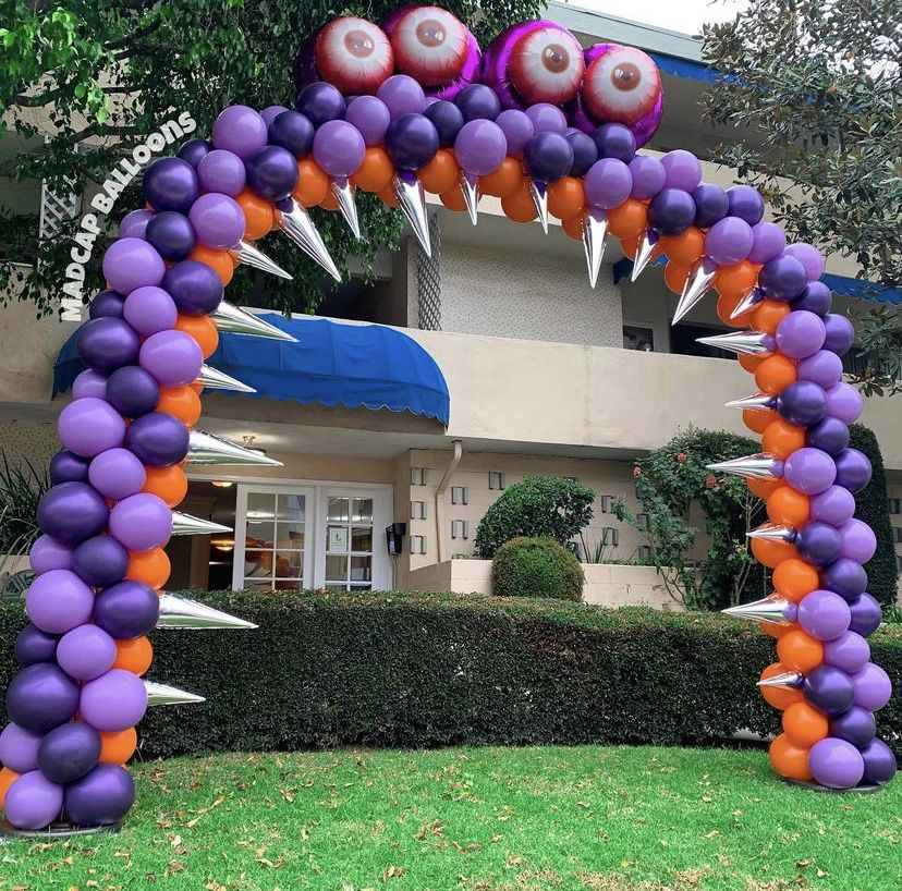 Purple monster balloon arch