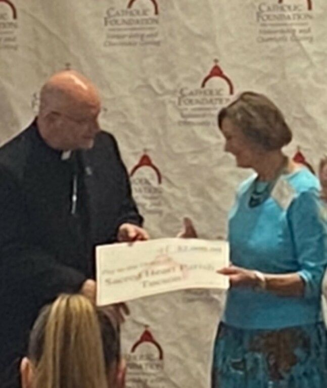 Bishop presents grant