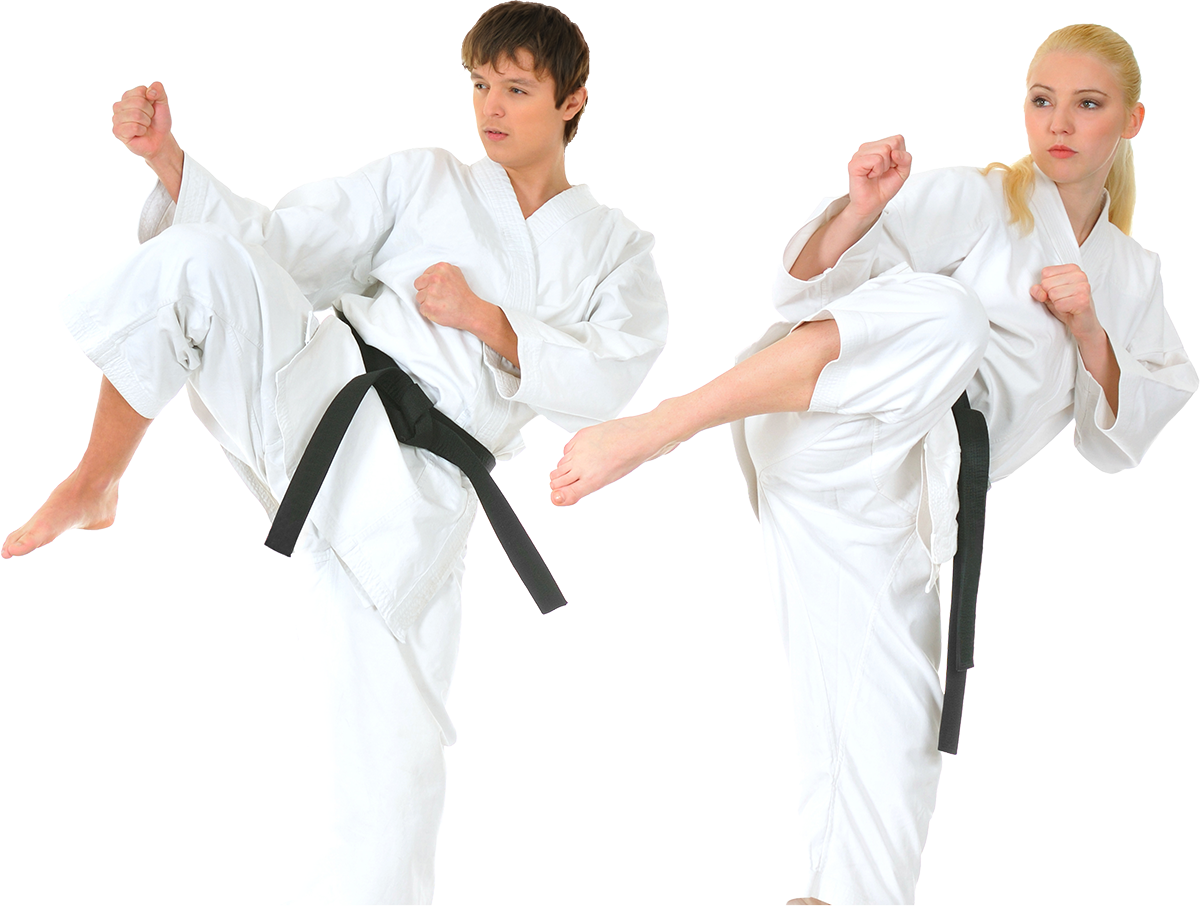 A boy and a girl are practicing karate with black belts