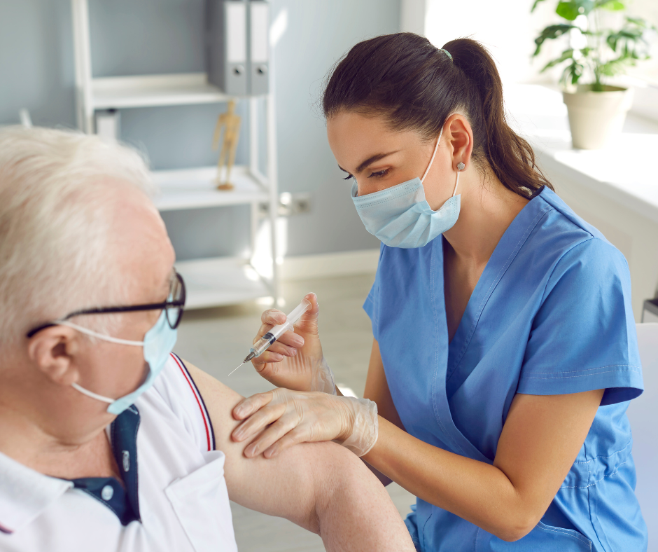 Doctor giving a flu shot.