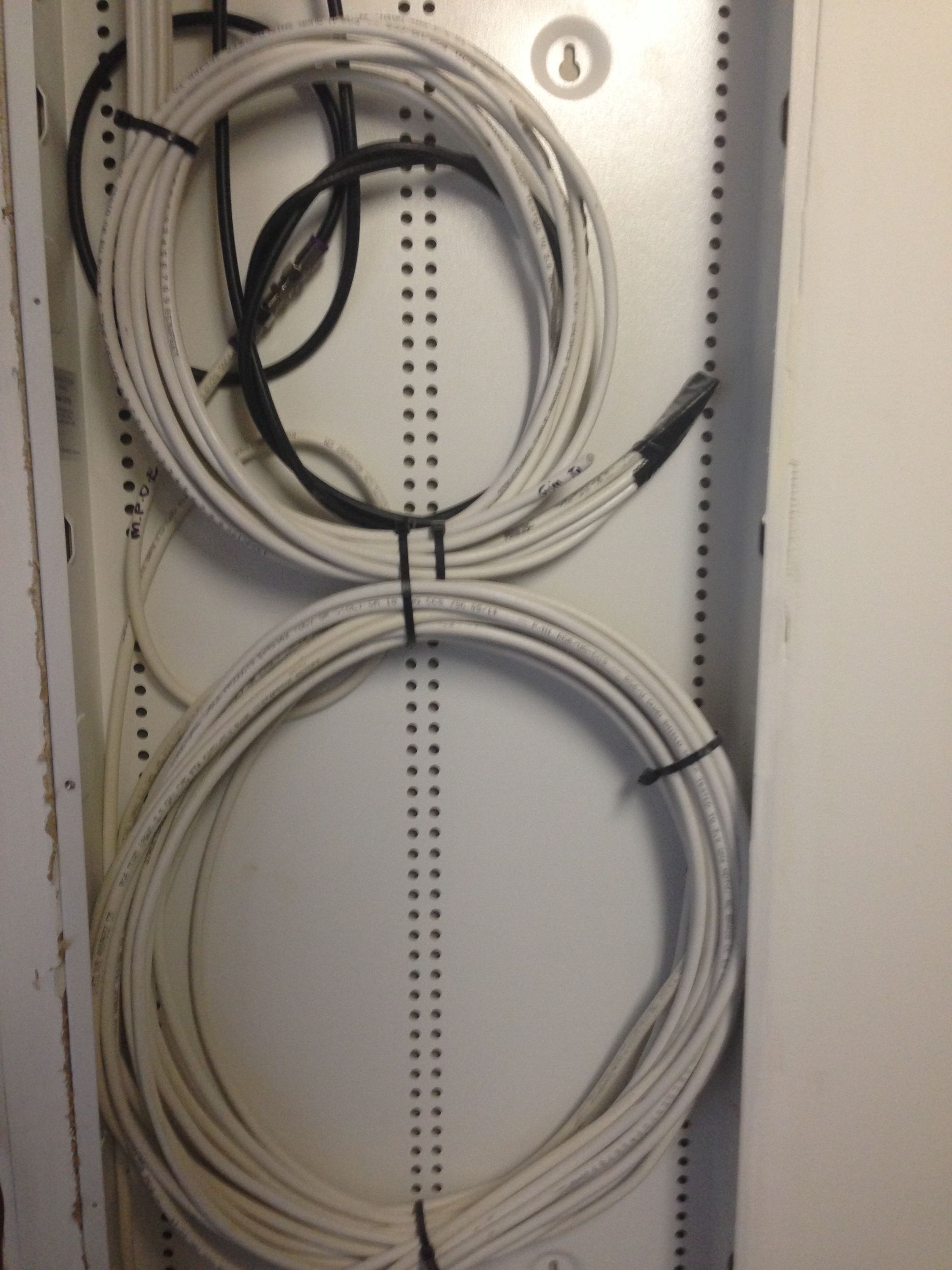 A rack with a bunch of electronics on it