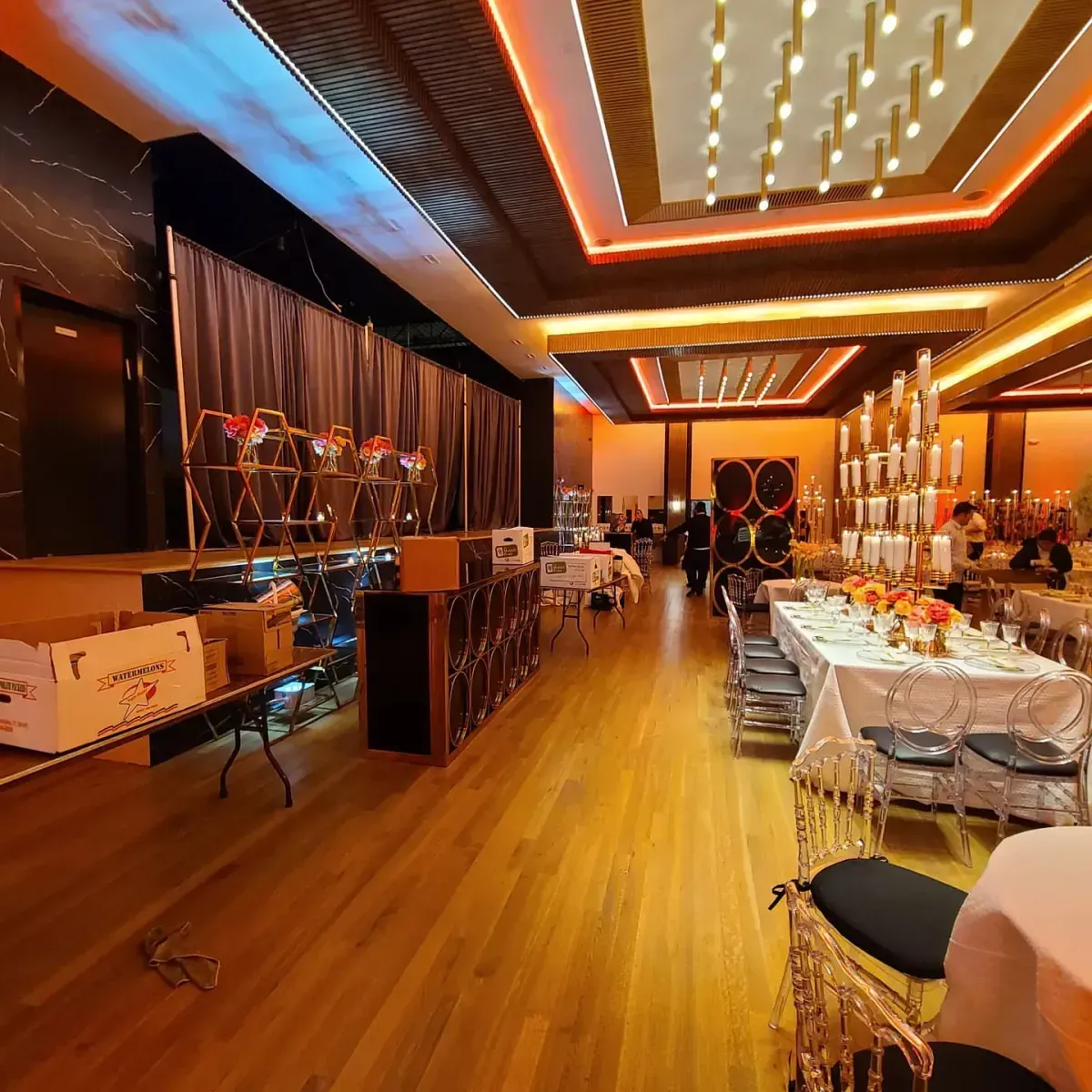 A large room with tables and chairs in it