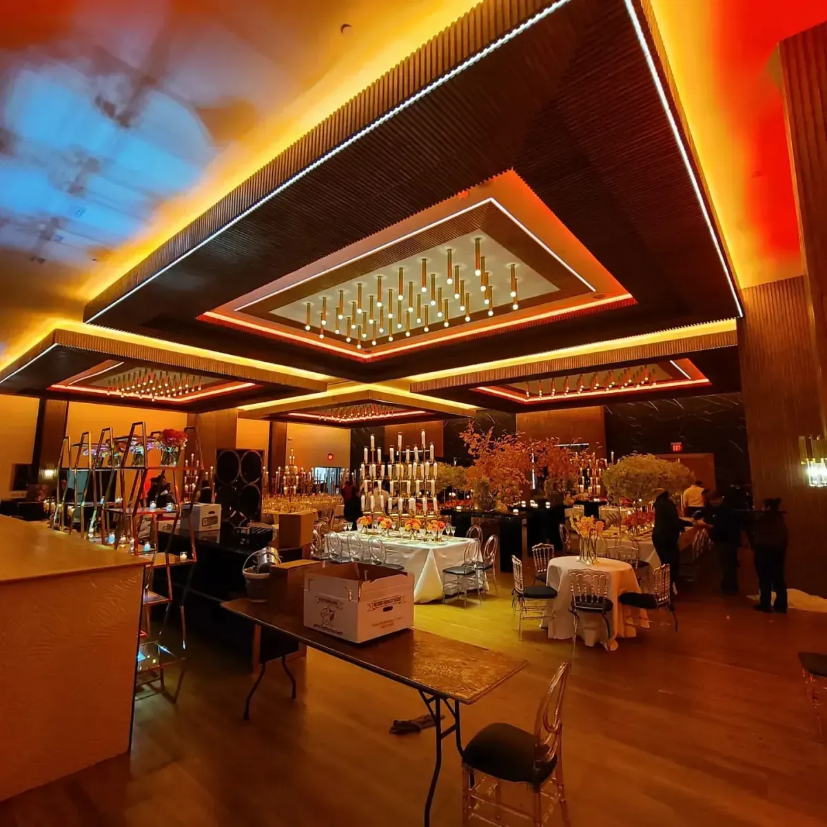 A large room with tables and chairs in it