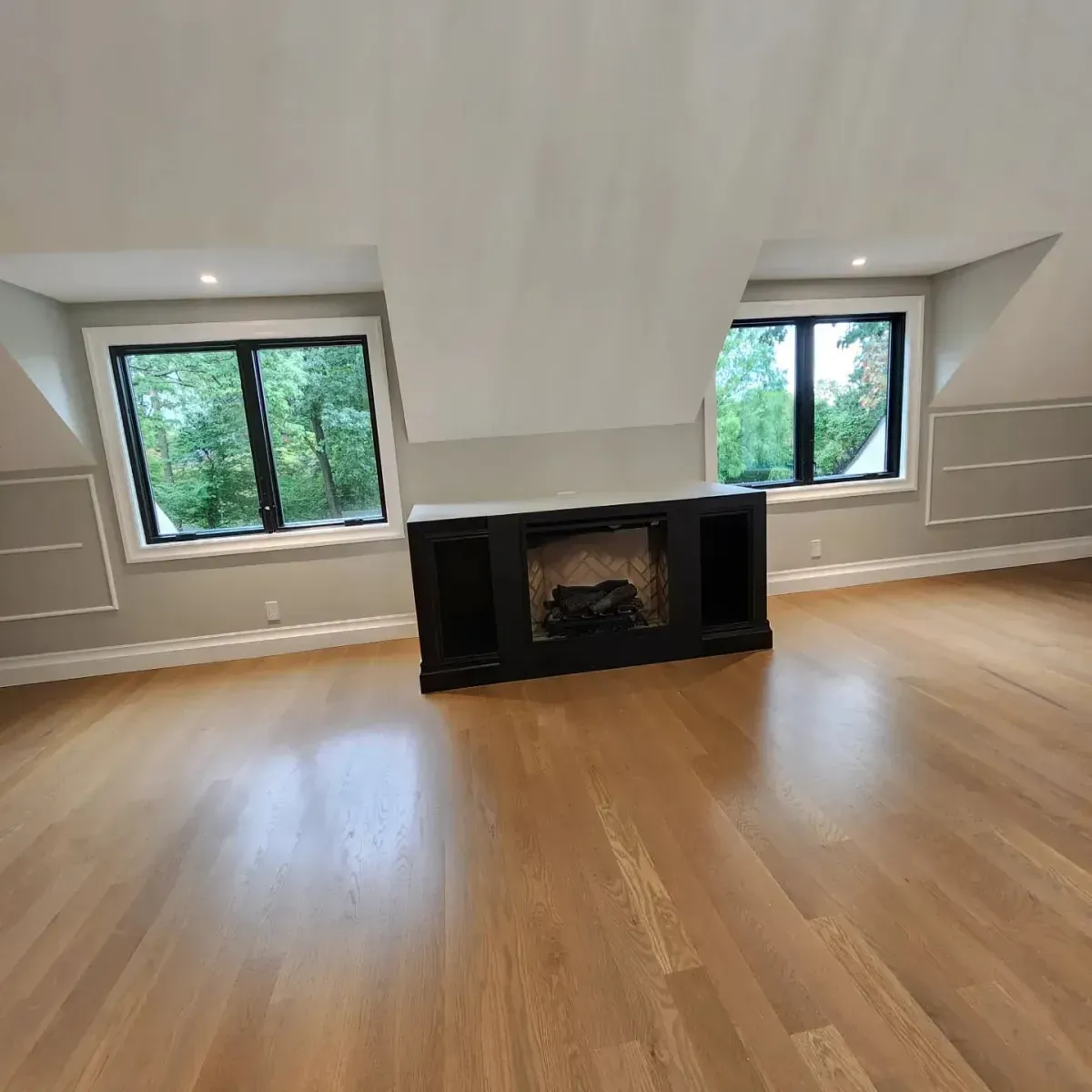 There is a fireplace in the middle of the room.