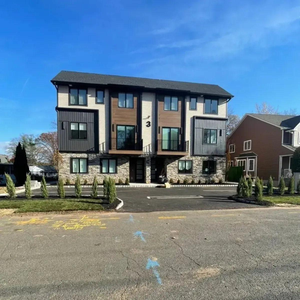 A large apartment building with a lot of windows