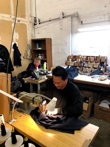 Uniform Tailoring — Man Sewing a Shirt in Seattle, WA
