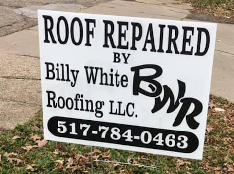 A sign that says roof repaired by billy white roofing llc