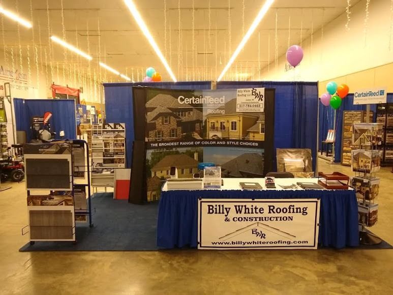 A billy white roofing and construction booth in a store