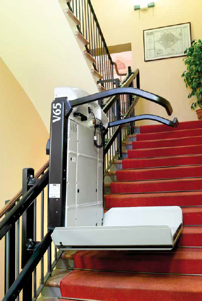 Servoscala con pedana curvilinea V65