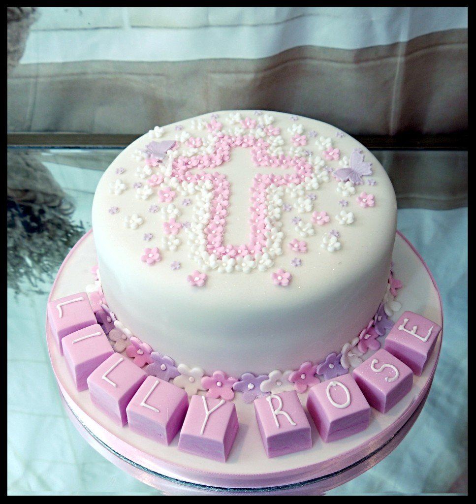 Christening cake with floral cross