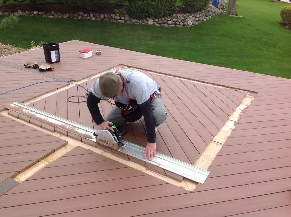 Man Working on a Deck — Island Lake, IL — Nelson Custom Builders Inc.