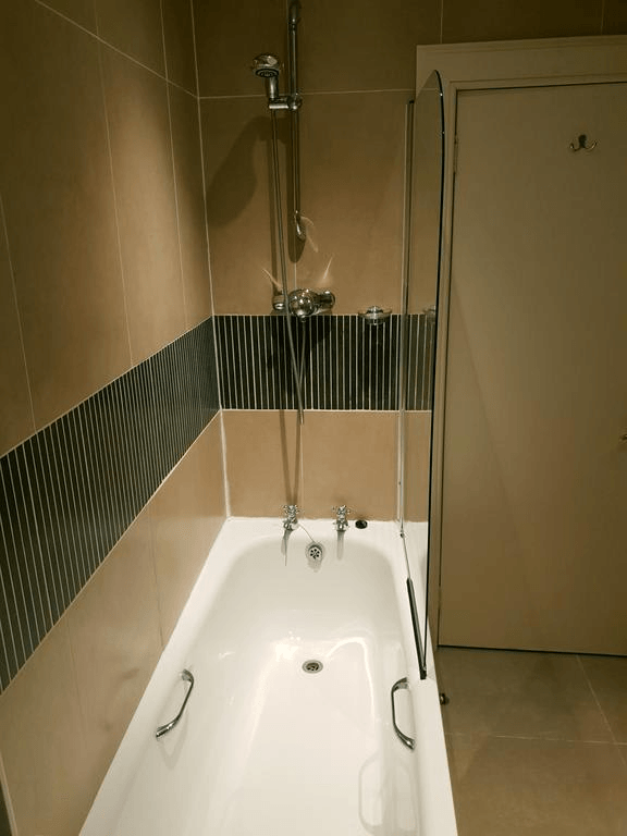 Bath and shower in hotel en-suite