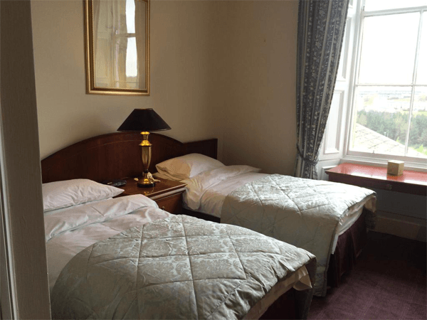 Hotel room with two twin beds