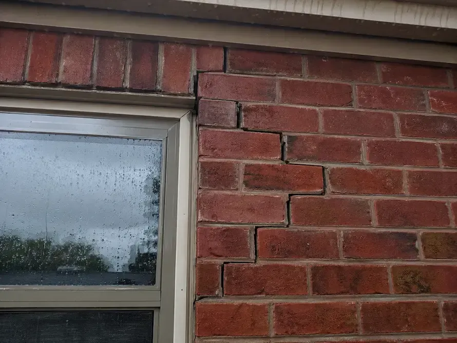 Insurance claims specialist analyzing engineering documentation to resolve a claim dispute.