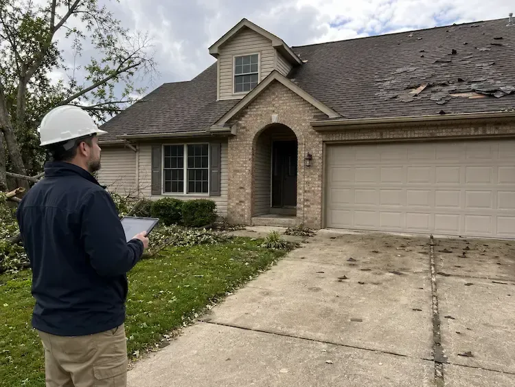 Insurance claims specialist analyzing engineering documentation to resolve a claim dispute.