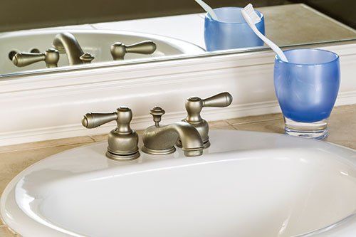 Drain Cleaning — Bathroom Sink with Tooth Brush in Plainfield, CT