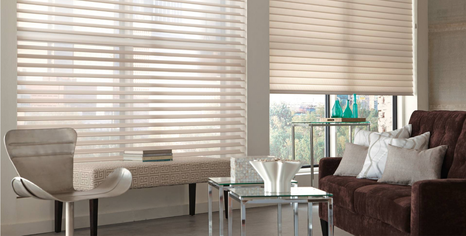 Living room with beige layered window blinds, brown sofa, and modern furniture.