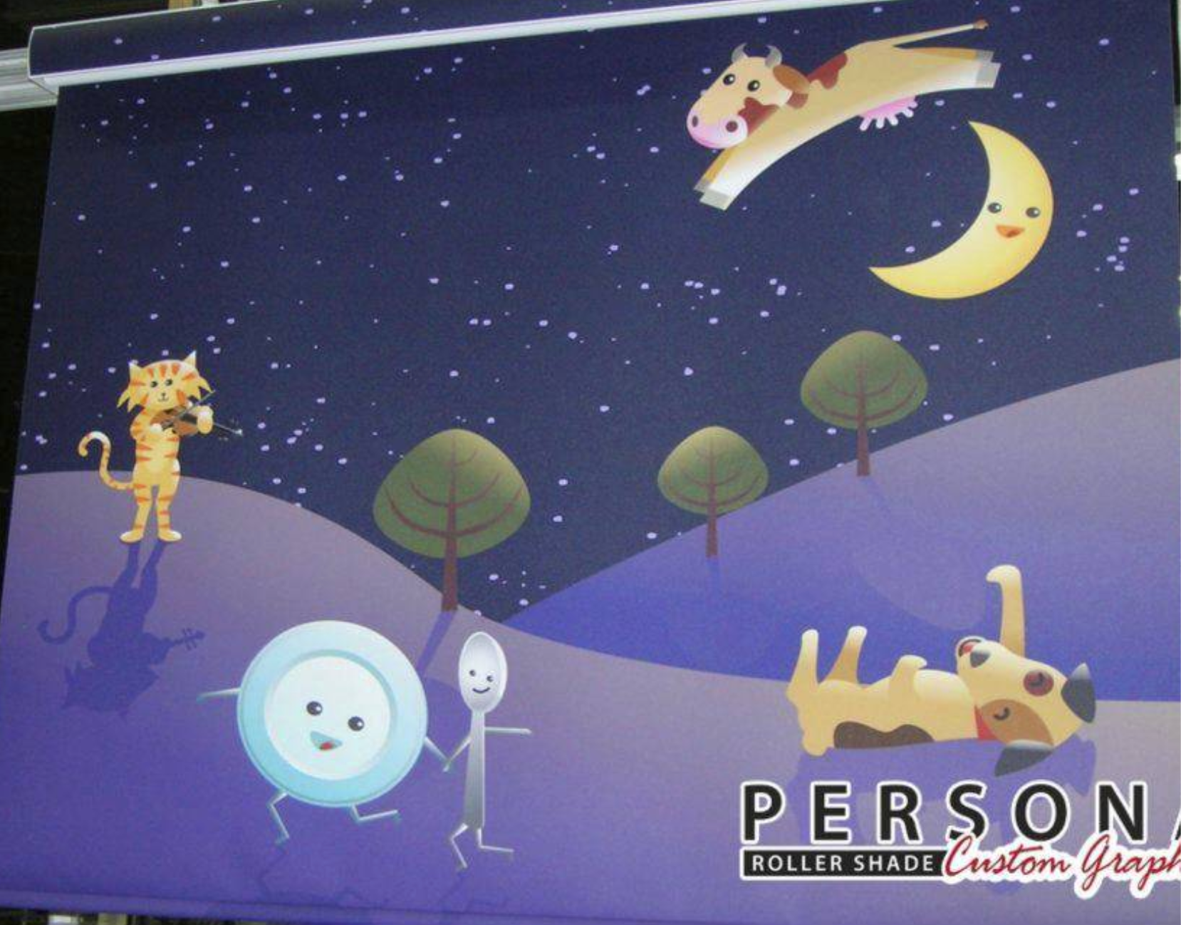 Nighttime scene with cartoon cow jumping over moon. Cat, dog, dish, and spoon in landscape.