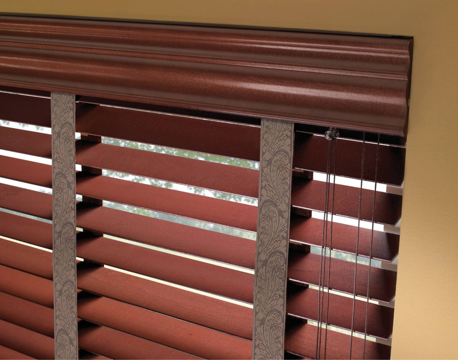 Wooden blinds are partially open, casting horizontal shadows on a light orange wall.
