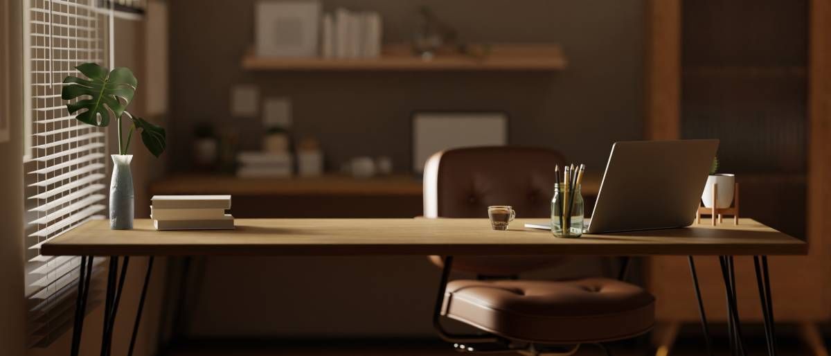 Custom window blinds covering a window in a furnished home office