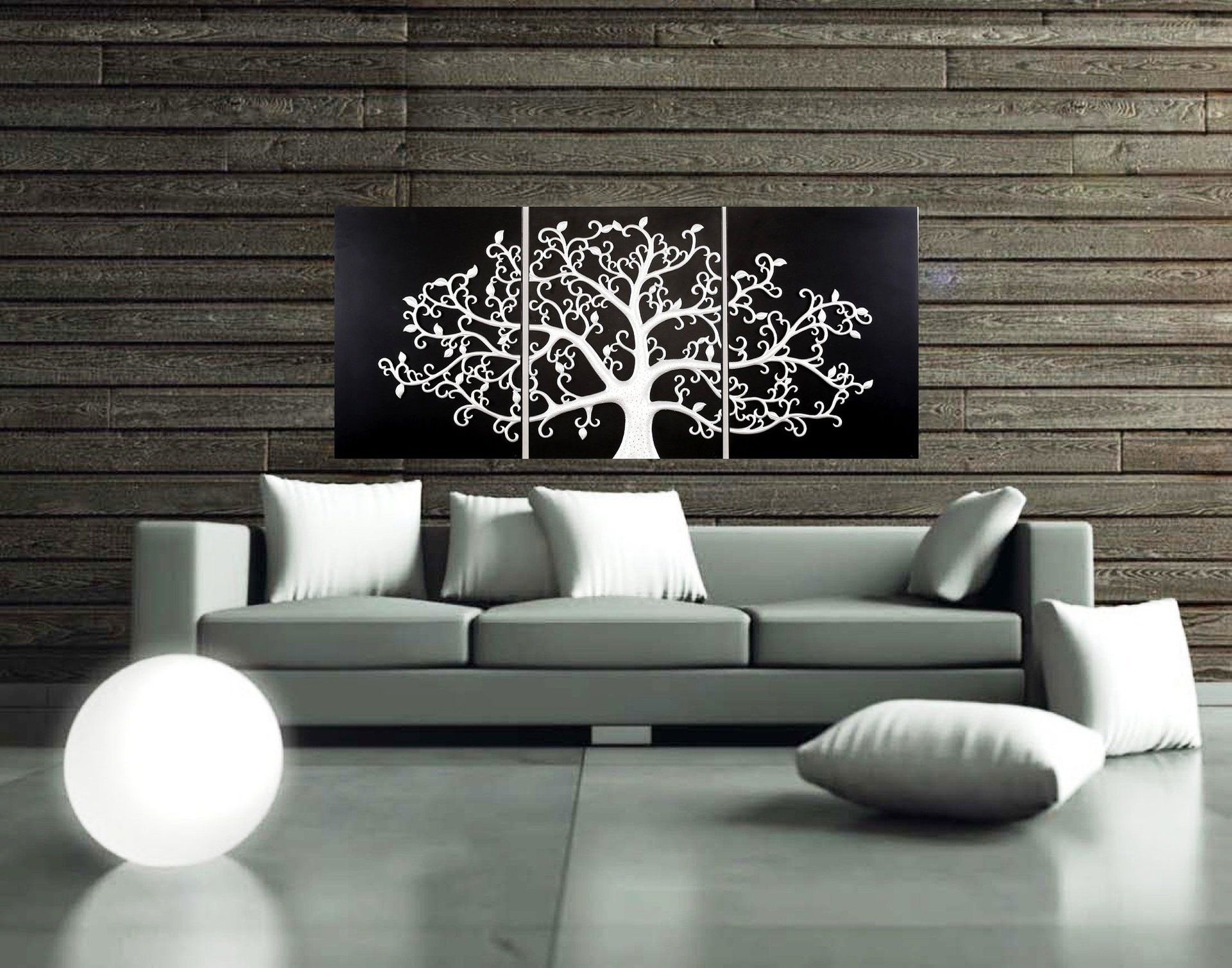 soggiorno con divano e quadro di un albero