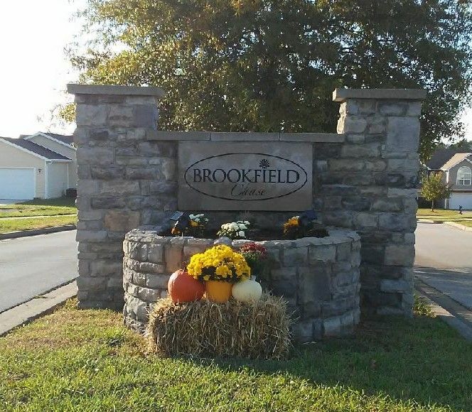A brick sign that says brookfield on it