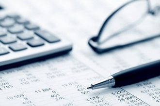 Pen, calculator and accounting document