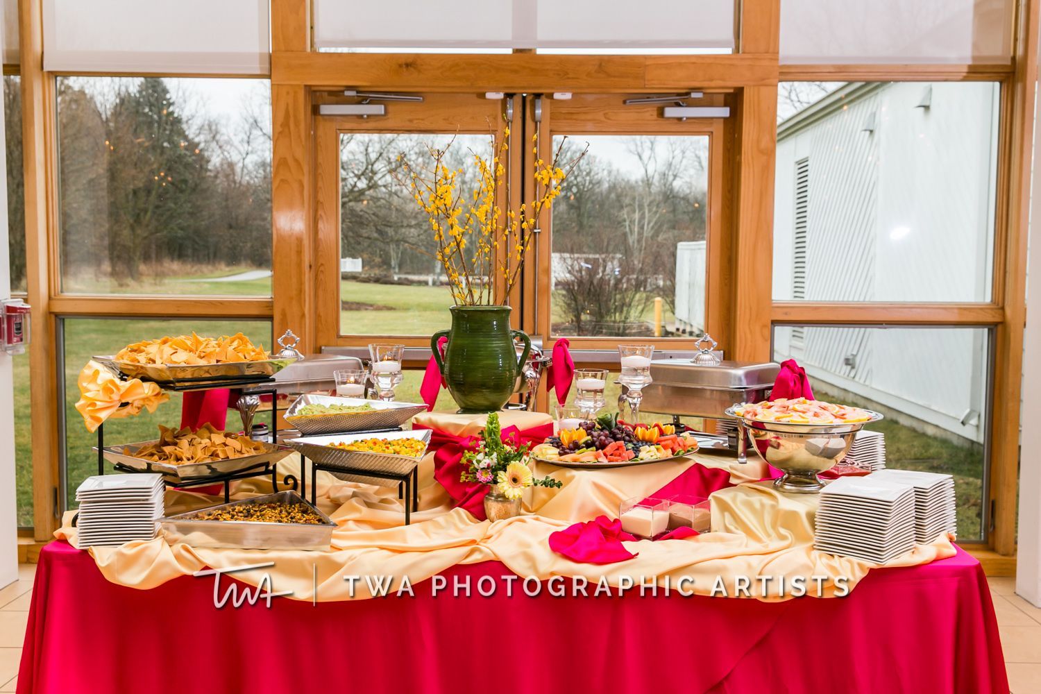 There is a buffet table with a lot of food on it.