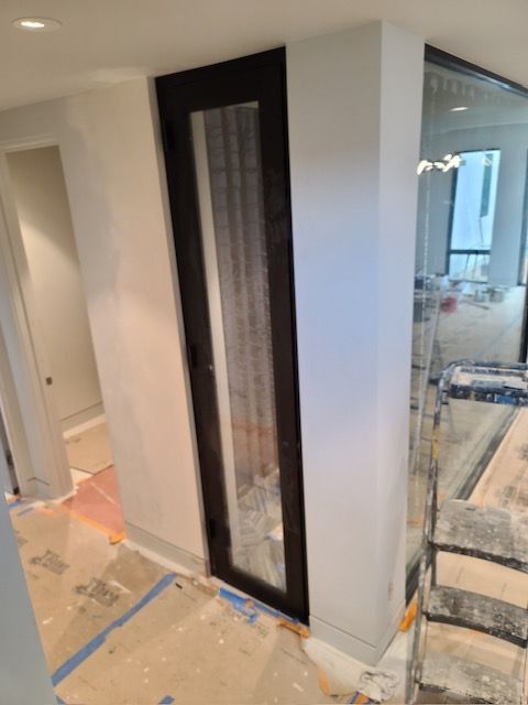 Hallway with a Black Door — San Diego, CA — Budget Glass Plus