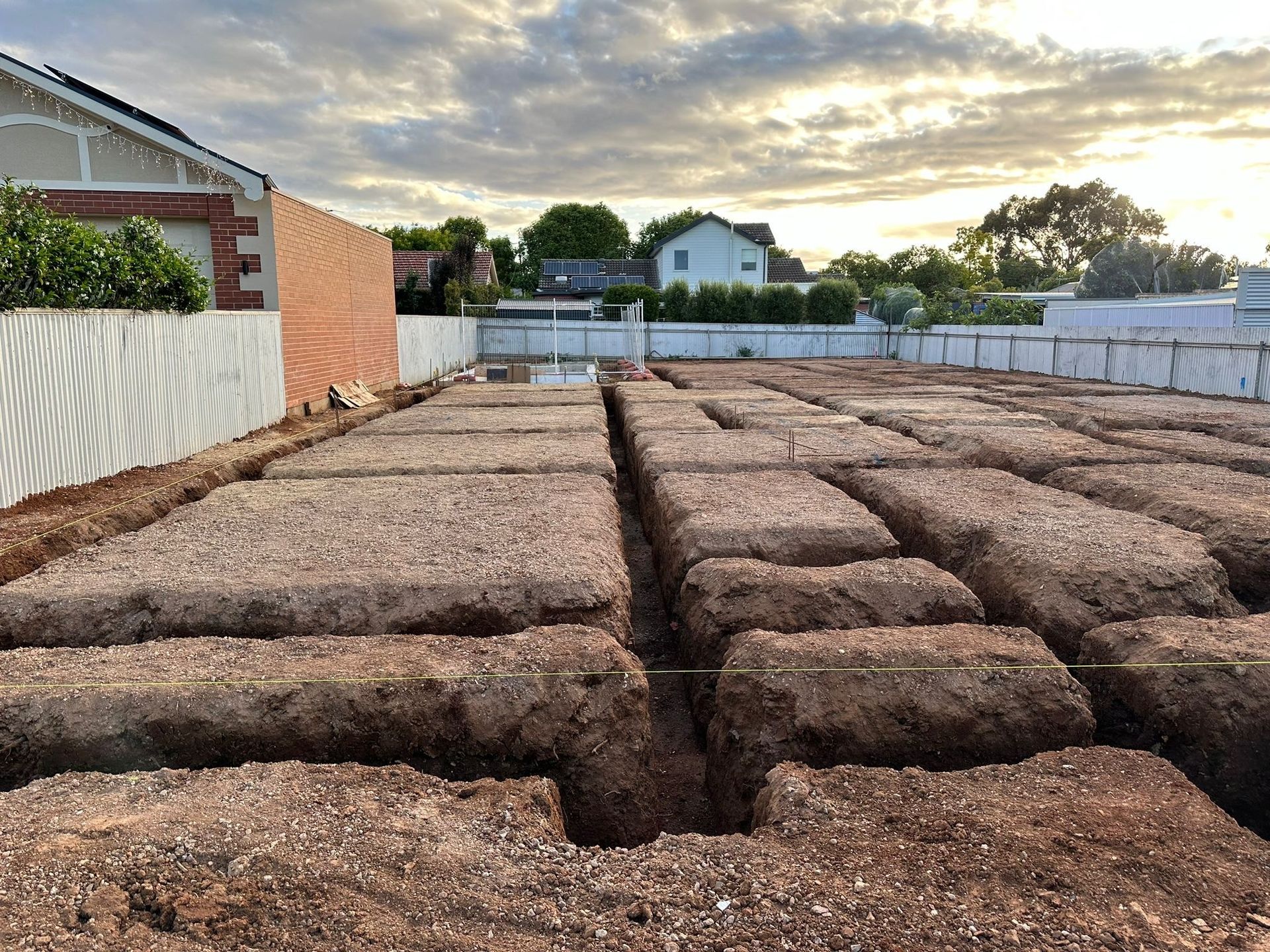 Footing trenches were dug out for slab preparation.